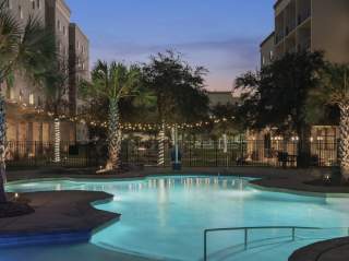 Hotel pool with outdoor lighting