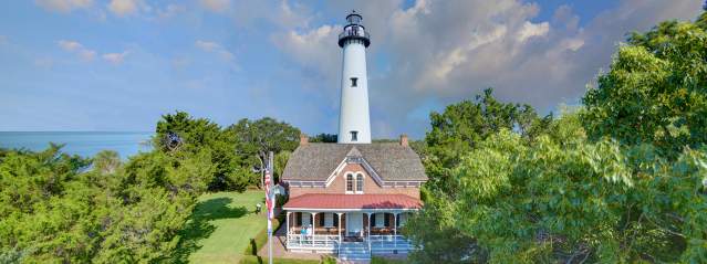 The St. Simons Island Lighthouse stands tall above the island's beautiful trees and waterways.