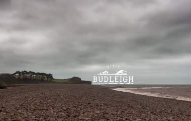grey skies over budleigh beach