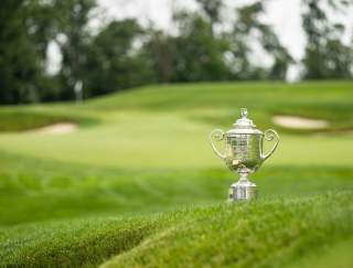 The Wanamaker Trophy sitting on the fairway of Aronimink Golf Course in Newtown Square