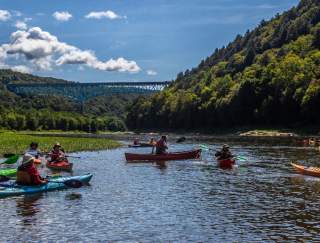 Group of people kayaking on a river