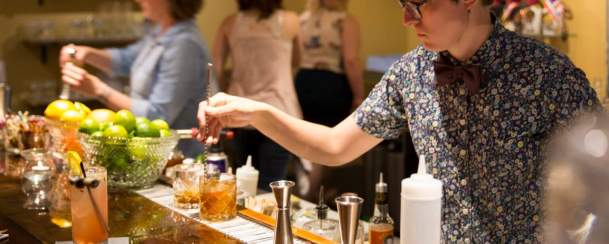 Bartender mixing drinks