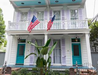 Garden District home, flags