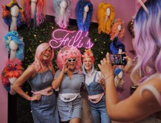 Trying on Wigs at Fifi Mahony’s in New Orleans