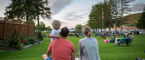 Family enjoying summer outdoor event.