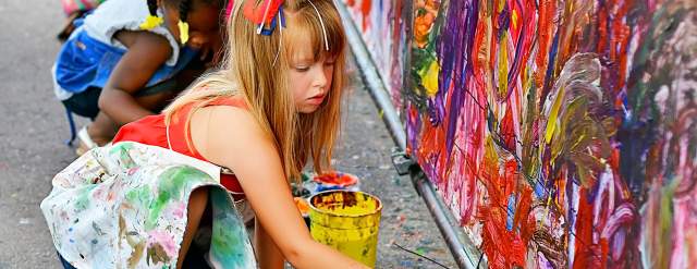 Little girls painting at the Cherry Creek Arts Festival