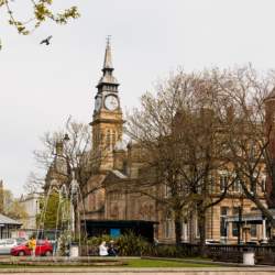 A tall clock tower building in Southport