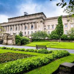 The colossal St George's Hall, a neo-classical building complete with lush green gardens.