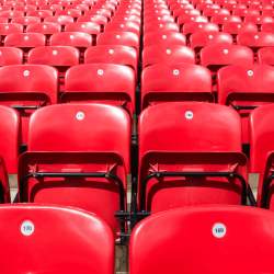 Empty red football stadium seats