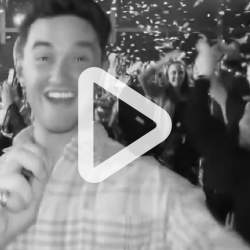 A frame from a video of Zack at Bongos Bingo with confetti coming down in the background