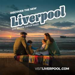 Front cover of the Liverpool City Region visitor guide showing a family enjoy a sunset picnic on the seafront.