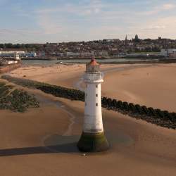 Aerial shot of New Brighton Beach and New Brighton Lighthouse