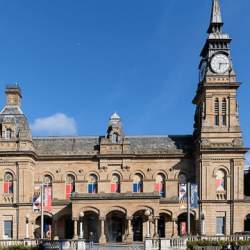 The Atkinson building in Southport, with a bright blue sky above.