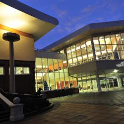 Floral Pavilion lit up at night