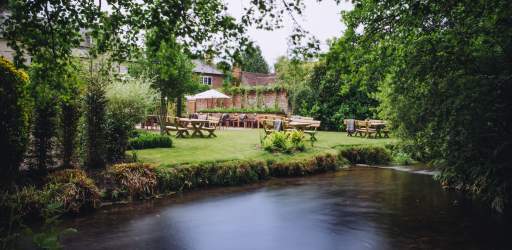 The Drummond at Albury - exterior by the river Tillingbourne