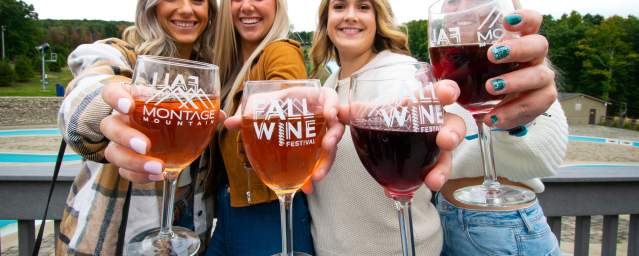 women holding wine glasses at Montage Mountain Fall Wine Festival