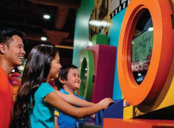 Family using Be A Star at Crayola Experience