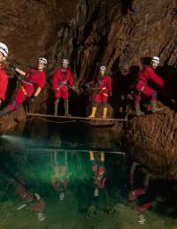A group on the Wild Wookey caving experience in Wookey Hole - credit Wookey Hole