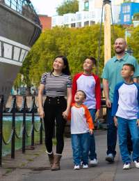 A family exploring the exterior of the SS Great Britain in the Great Western Dockyard, Bristol - credit Brunel's SS Great Britain