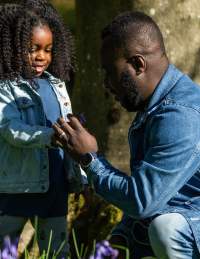 A father and daughter exploring the grounds at Westonbirt Arboretum near Bristol - credit Johnny Hathaway