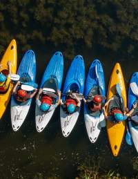 A group of people kayaking at Mendip Activity Centre, near Bristol - credit Mendip Activity Centre