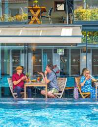 Bristol Lido people dining by pool
