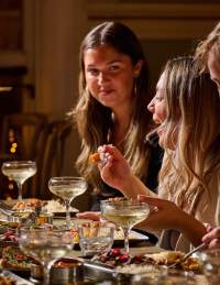 People enjoying a meal at Mowgli