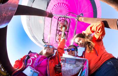 A group of people in a balloon basket at Bristol International Balloon Fiesta - credit Paul Box
