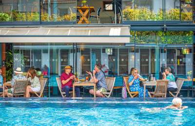 Bristol Lido people dining by pool