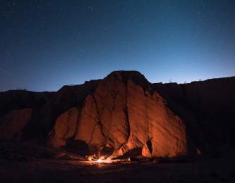 Campers enjoy a fire and stargaze at Anza-Borrego Desert State Park