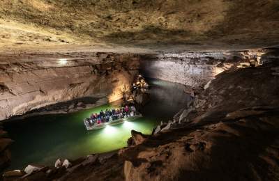 People Boating Through Lost River Cave