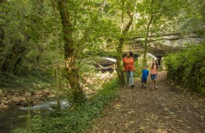 Family Walking A Hiking Trail at Lost River Cave in Bowling Green, KY