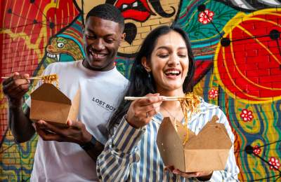 Couple eating Chinese food
