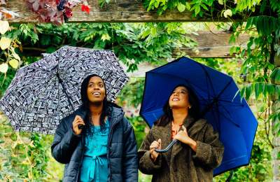 Two ladies with umbrellas