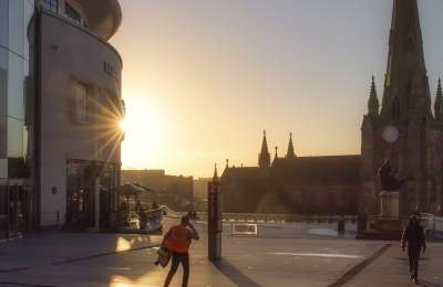 A sunrise in Birmingham city centre, overlooking St Martin in the Bullring church and Bullring shopping centre
