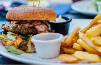 A burger and chips on a plate