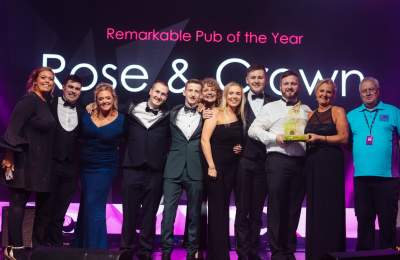 Staff from Rose and Crown receiving a REYTA award