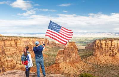Dillon and Teagan at Colorado National Monument with America Flag