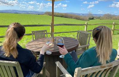 People sitting in the garden at The Welldiggers Arms
