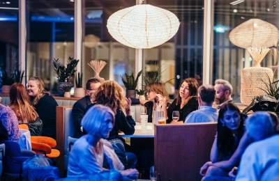 people sitting in a bar