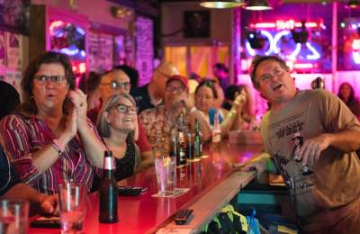 people sitting at bar