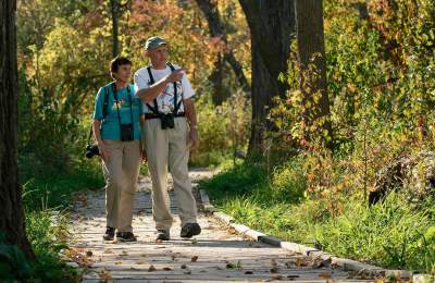 A stroll through Fontenelle Forest features a natural backdrop for couples