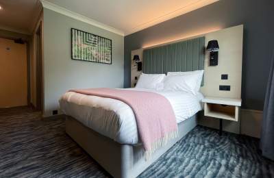 An image of a hotel bedroom at Warwick Conferences Scarman