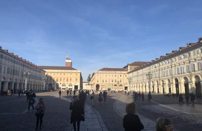 People walking through Piazza San Carlo in Torino