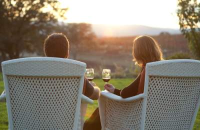 couple drinking wine at sunset_juice media credit