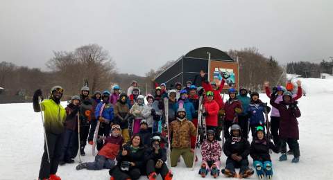 A group skiing in Vermont