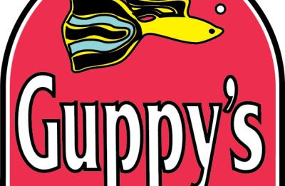 Guppy's On the Beach logo