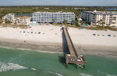 Gulf Front 2 & 3 Bedroom condos with beachside pool, jacuzzi and private pier!