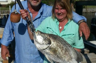 Captain Terry and customer with a big Triple Tail