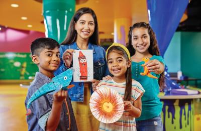 Family creating colorful keepsakes